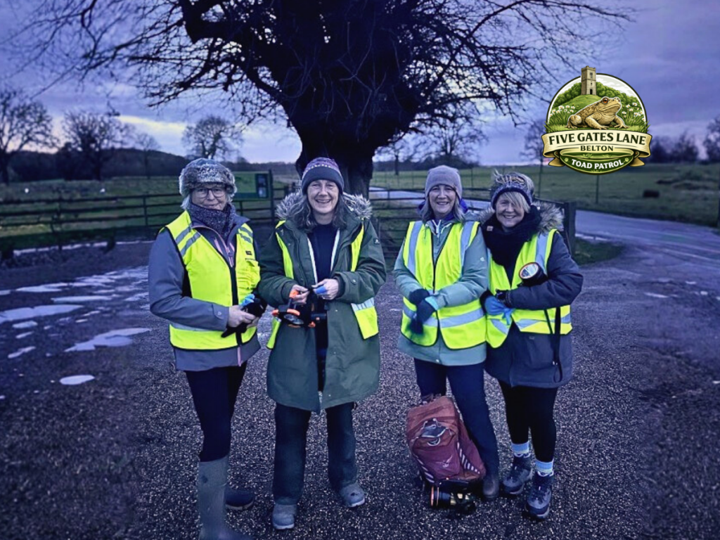 Volunteers from Five Gates Lane Toad Patrol standing together before an evening patrol during amphibian migration season.